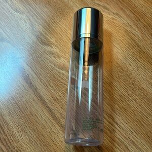 La Mer empty toner bottle.